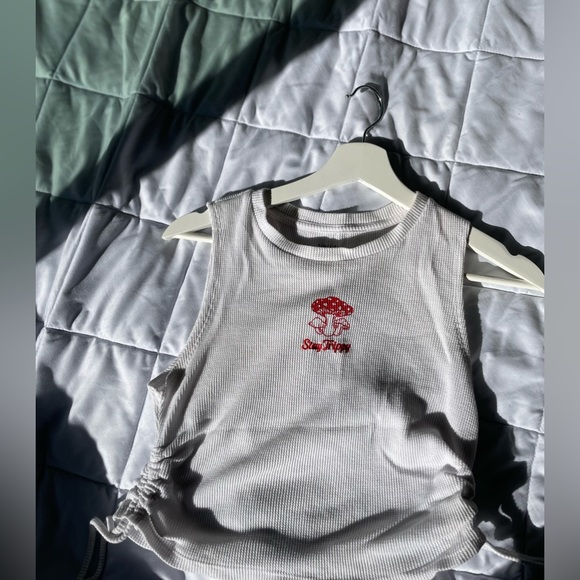 Its a fun Home girl society crop top , size medium and white in colour - Picture 5 of 6